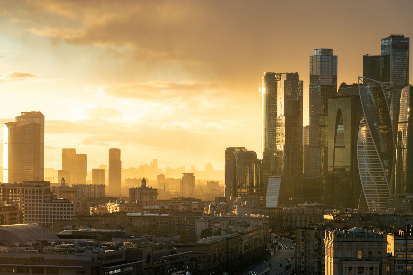 a view of a city with tall buildings