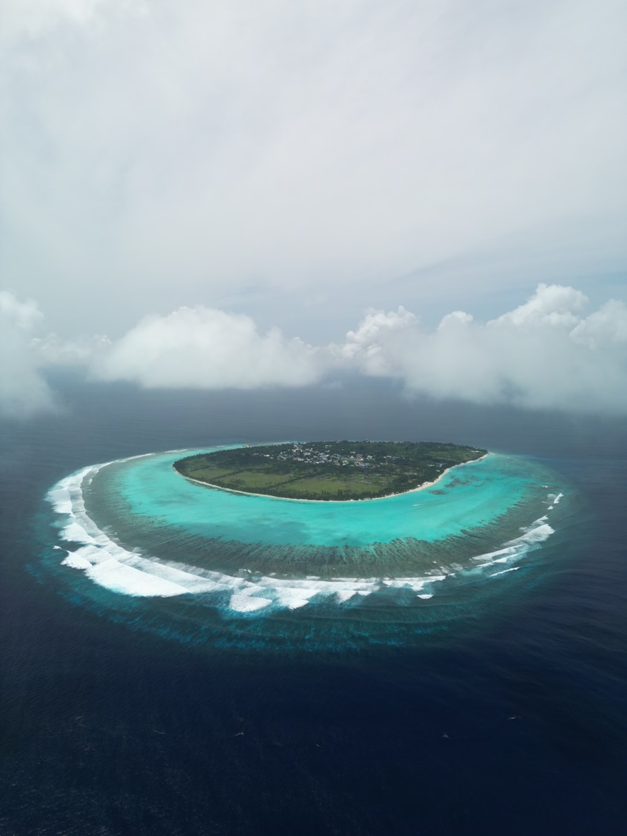 An island surrounded by turquoise water.